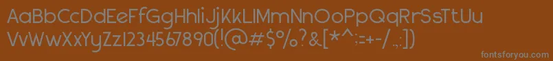 Шрифт NotSoStoutDeco – серые шрифты на коричневом фоне