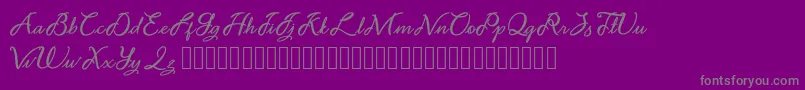 Noviyani Demo-fontti – harmaat kirjasimet violetilla taustalla