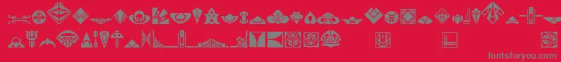 Novo Deco Ornaments-Schriftart – Graue Schriften auf rotem Hintergrund