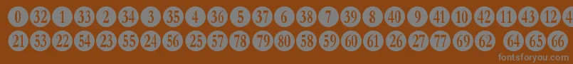 numberpile Font – Gray Fonts on Brown Background
