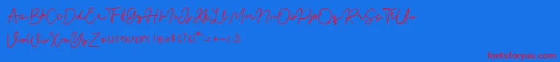 Nusapenida Signature Font – Red Fonts on Blue Background