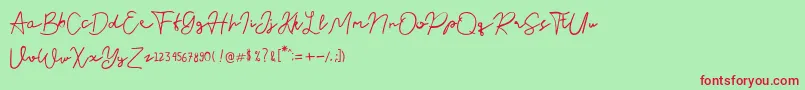 フォントNusapenida Signature – 赤い文字の緑の背景
