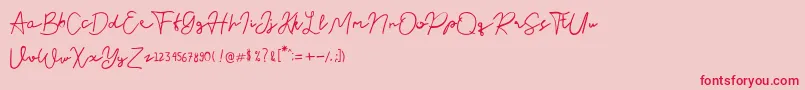 Nusapenida Signature-Schriftart – Rote Schriften auf rosa Hintergrund