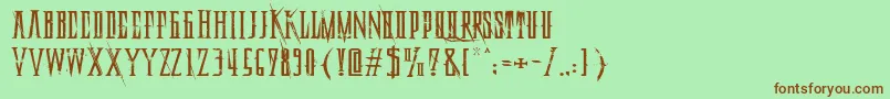 DeadlyBlackChainExtended Font – Brown Fonts on Green Background