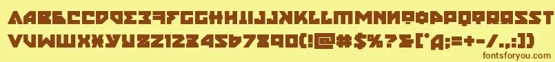 フォントnyetbold – 茶色の文字が黄色の背景にあります。