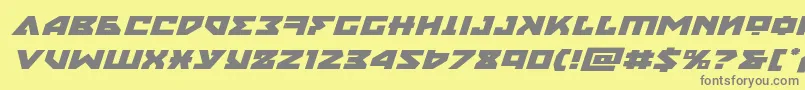 nyetexpandital-fontti – harmaat kirjasimet keltaisella taustalla
