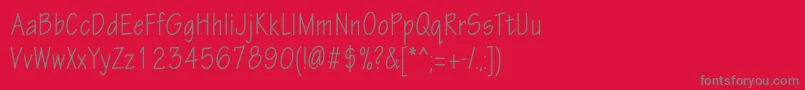 Шрифт Eskiztwocondc – серые шрифты на красном фоне