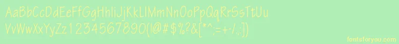 Eskiztwocondc Font – Yellow Fonts on Green Background