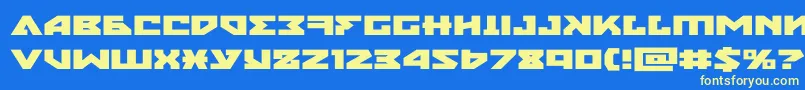 nyetxtraexpand Font – Yellow Fonts on Blue Background
