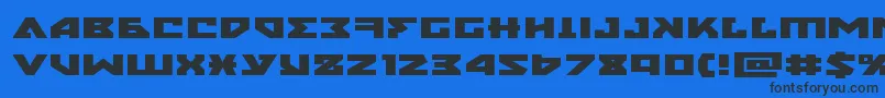nyetxtraexpand Font – Black Fonts on Blue Background