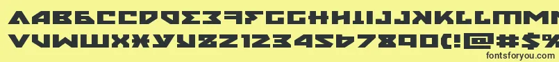 nyetxtraexpand Font – Black Fonts on Yellow Background