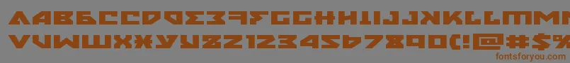 nyetxtraexpand-Schriftart – Braune Schriften auf grauem Hintergrund