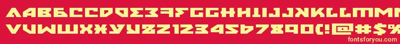 nyetxtraexpand-Schriftart – Gelbe Schriften auf rotem Hintergrund