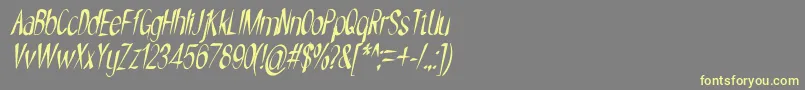 フォントNYOEHOKA ITALIC – 黄色のフォント、灰色の背景