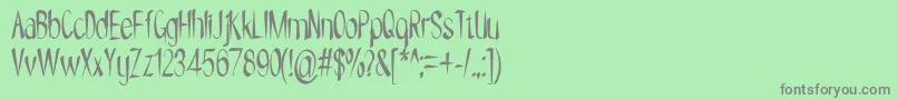 フォントNYOEHOKA – 緑の背景に灰色の文字