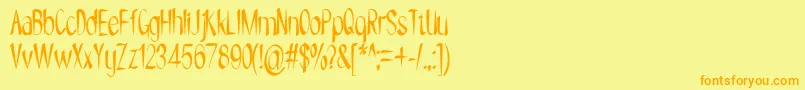 フォントNYOEHOKA – オレンジの文字が黄色の背景にあります。