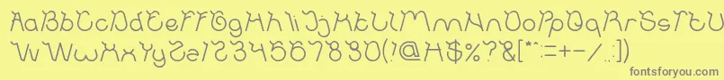 フォントOcean Free Light – 黄色の背景に灰色の文字