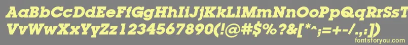 LugacBolditalic Font – Yellow Fonts on Gray Background