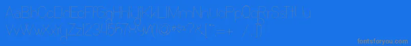 フォントOcho Siete – 青い背景に灰色の文字