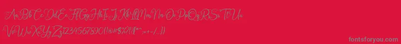 Fonte Octhovia Demo – fontes cinzas em um fundo vermelho