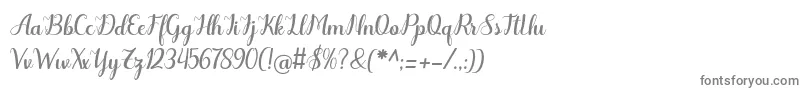 フォントOdelette – 白い背景に灰色の文字