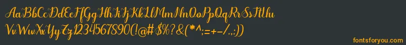 フォントOdelette – 黒い背景にオレンジの文字