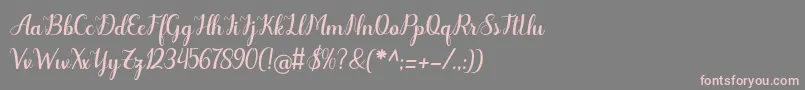 Weitere Informationen zur Odelette-Schriftart Odelette-Schriftart – Rosa Schriften auf grauem Hintergrund