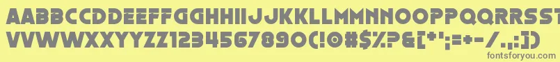 フォントOestrogen – 黄色の背景に灰色の文字