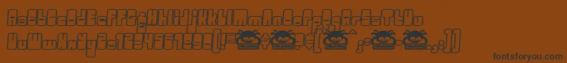 OGGLE    Font – Black Fonts on Brown Background