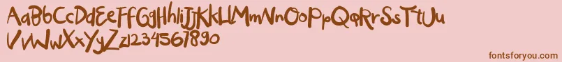 OGYIGO Font – Brown Fonts on Pink Background