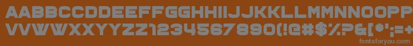 Ohno-fontti – harmaat kirjasimet ruskealla taustalla
