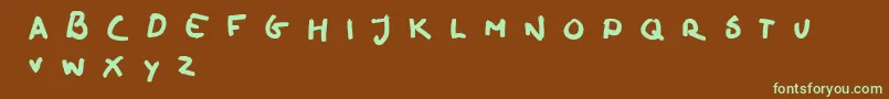 oilhand-Schriftart – Grüne Schriften auf braunem Hintergrund