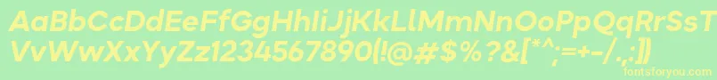 Okta BoldItalic-fontti – keltaiset fontit vihreällä taustalla