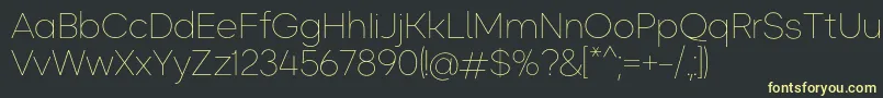 Okta ExtraLight Font – Yellow Fonts on Black Background