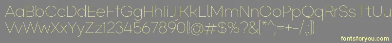 Okta ExtraLight Font – Yellow Fonts on Gray Background