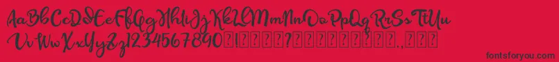 Olcigatte DEMO-Schriftart – Schwarze Schriften auf rotem Hintergrund