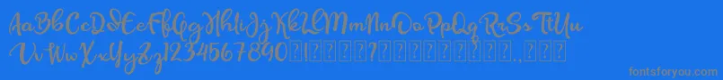 Olcigatte DEMO-Schriftart – Graue Schriften auf blauem Hintergrund