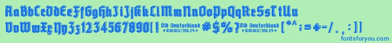 Czcionka Old Deutschland – niebieskie czcionki na zielonym tle