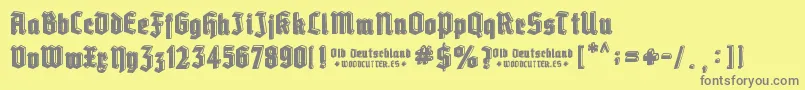 Old Deutschland-Schriftart – Graue Schriften auf gelbem Hintergrund