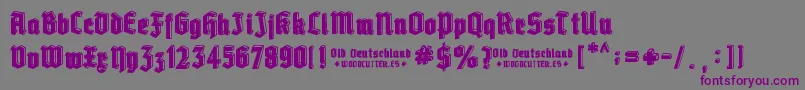 Old Deutschland-fontti – violetit fontit harmaalla taustalla