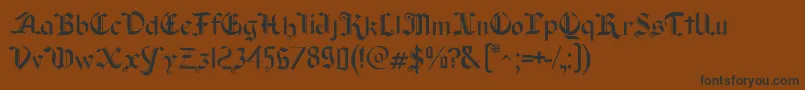 Old Wise Lord Font – Black Fonts on Brown Background