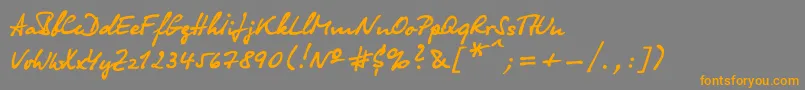 フォントOlga – オレンジの文字は灰色の背景にあります。