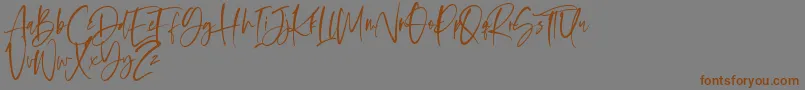 Fonte Oliver Notes – fontes marrons em um fundo cinza