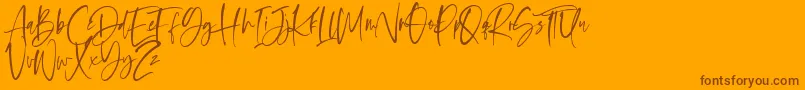 Fonte Oliver Notes – fontes marrons em um fundo laranja