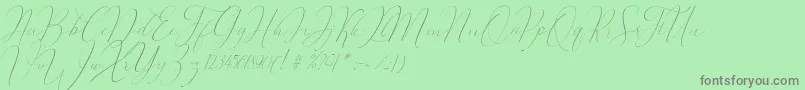 フォントOliverra – 緑の背景に灰色の文字
