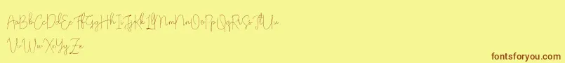 Olivia Demo-Schriftart – Braune Schriften auf gelbem Hintergrund