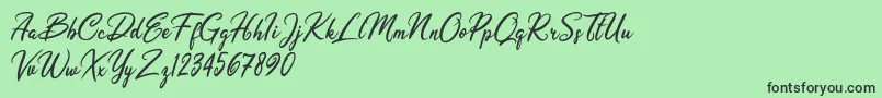 Olivia Dhorgent-fontti – mustat fontit vihreällä taustalla