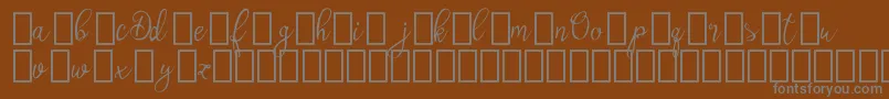 Шрифт Olyber Demo – серые шрифты на коричневом фоне