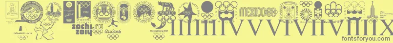 OLYMPIAD XXX-fontti – harmaat kirjasimet keltaisella taustalla