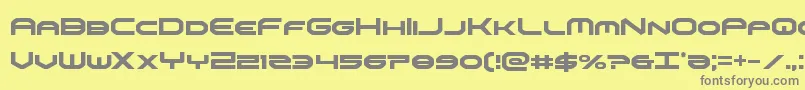 フォントomniboycond – 黄色の背景に灰色の文字